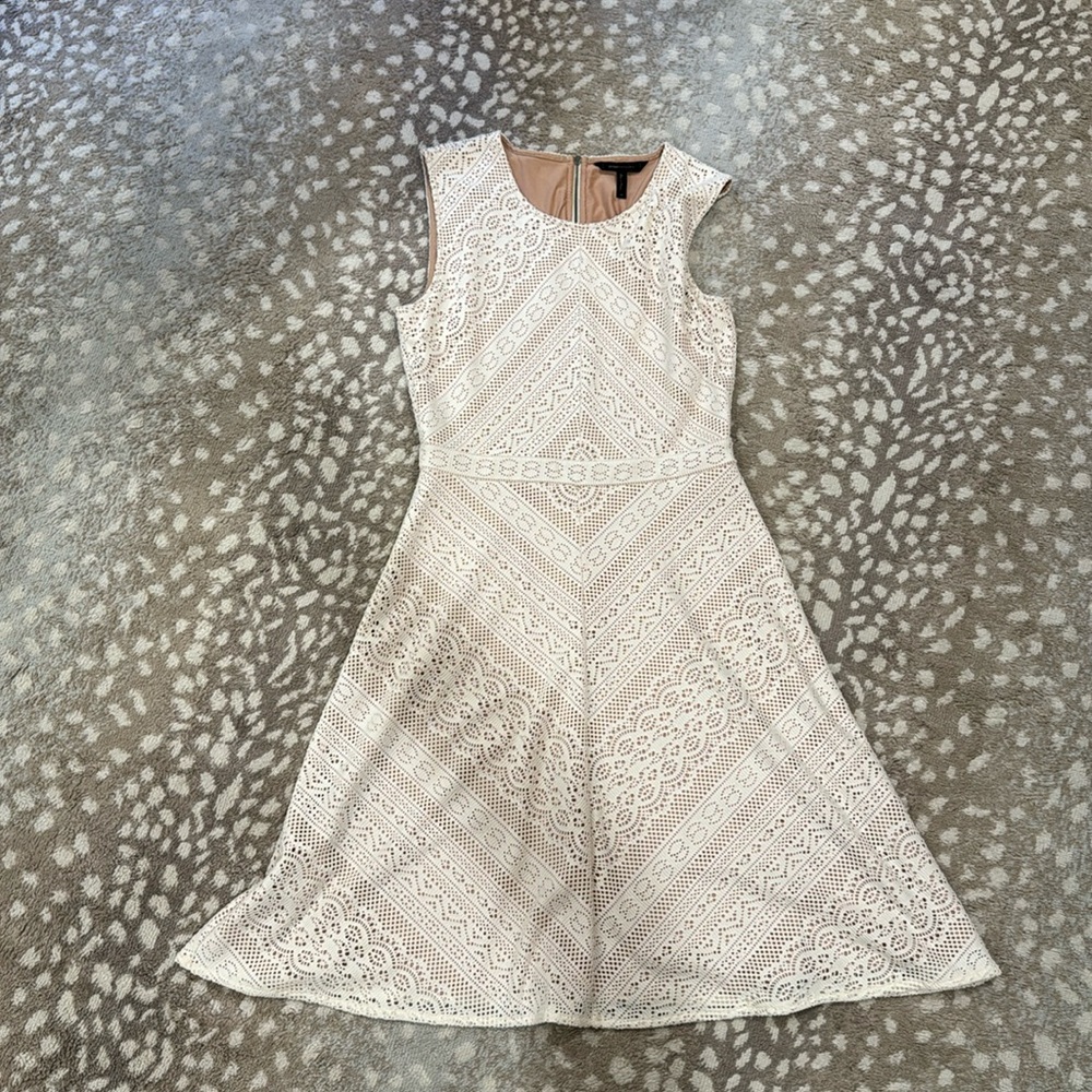 This dress is adorable!   Cream with nude lining